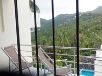Eden apartment balcony overlooking coconut plantation